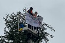 Climate activists cut top off iconic Berlin Christmas tree