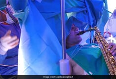 Patient plays saxophone while undergoing brain surgery in Italy