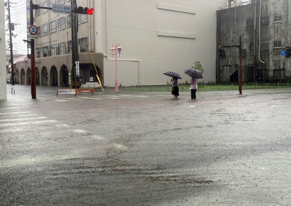 Million urged to seek shelter as floods and landslides hit Japan