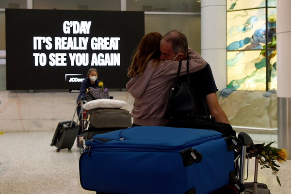 Scenes of joy as Australia's international travel restarts after nearly 20 months