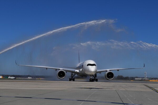 Scenes of joy as Australia's international travel restarts after nearly 20 months