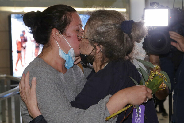 Scenes of joy as Australia's international travel restarts after nearly 20 months