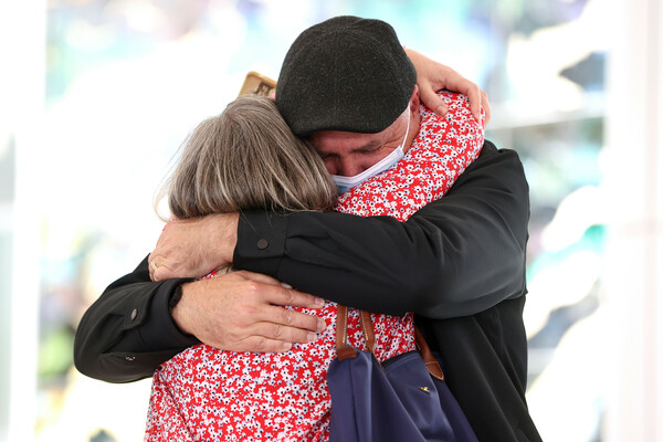 Scenes of joy as Australia's international travel restarts after nearly 20 months