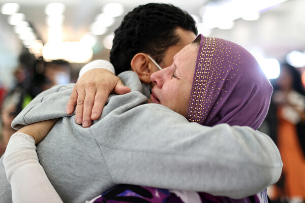 Scenes of joy as Australia's international travel restarts after nearly 20 months