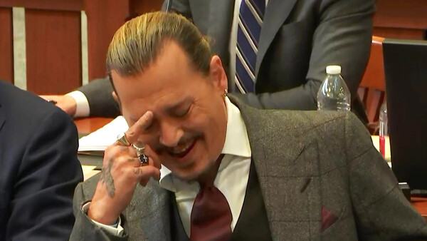 Johnny Depp Laughs in Court as His Bodyguard Is Asked on the Stand Whether He Saw Actor's Penis