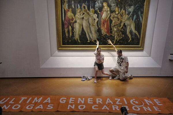 Climate activists in Italy glue themselves to Botticelli painting