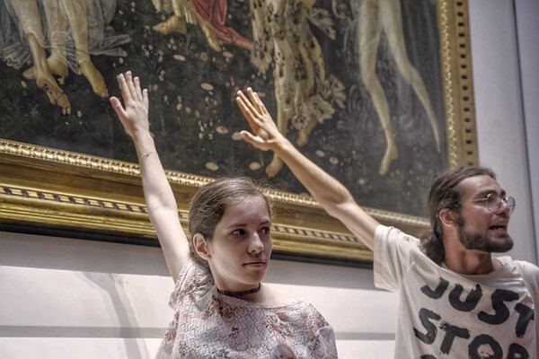 Climate activists in Italy glue themselves to Botticelli painting