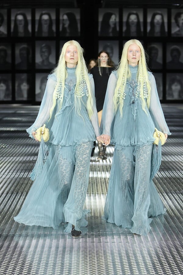 Gucci dresses 68 identical twins in matching finery at Milan