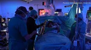 Patient plays saxophone while undergoing brain surgery in Italy