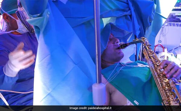 Patient plays saxophone while undergoing brain surgery in Italy