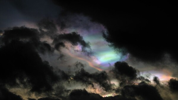 Ultra-rare 'rainbow clouds' light up the Arctic Circle like auroras in stunning new photos